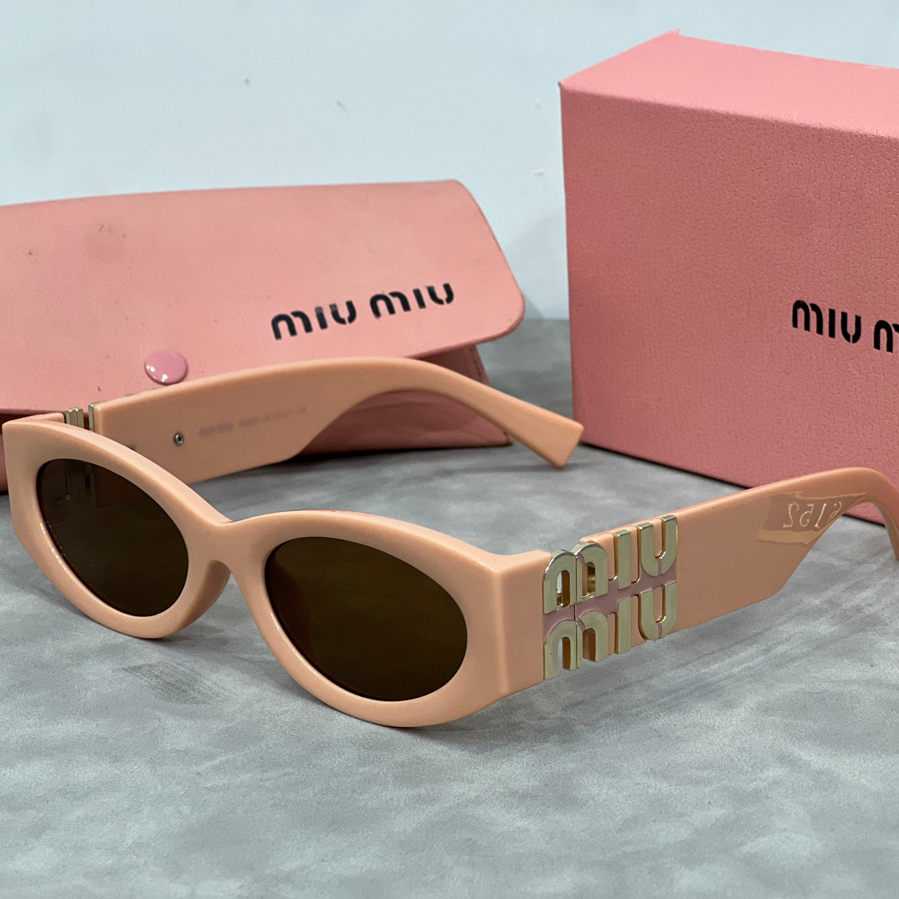 MM Cat-Eye-Sonnenbrille mit Logo