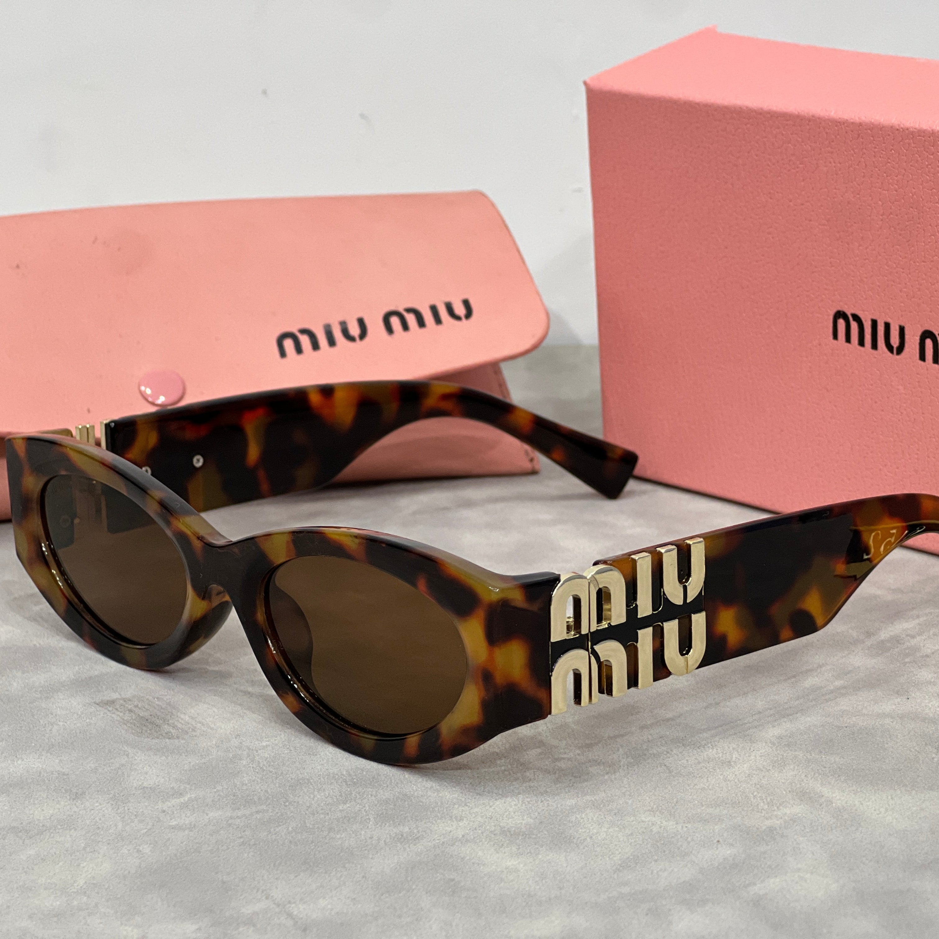 MM Cat-Eye-Sonnenbrille mit Logo