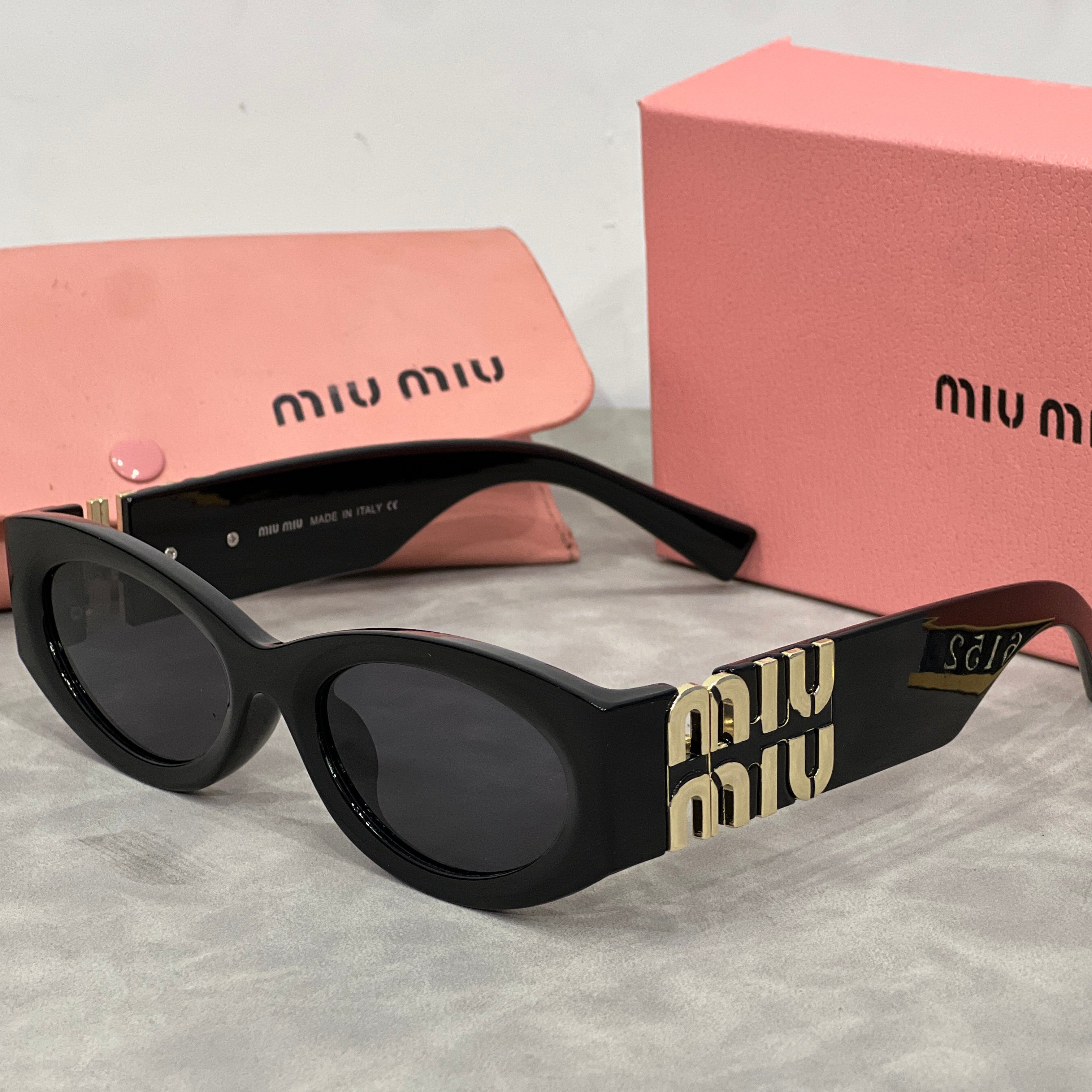 MM Cat-Eye-Sonnenbrille mit Logo